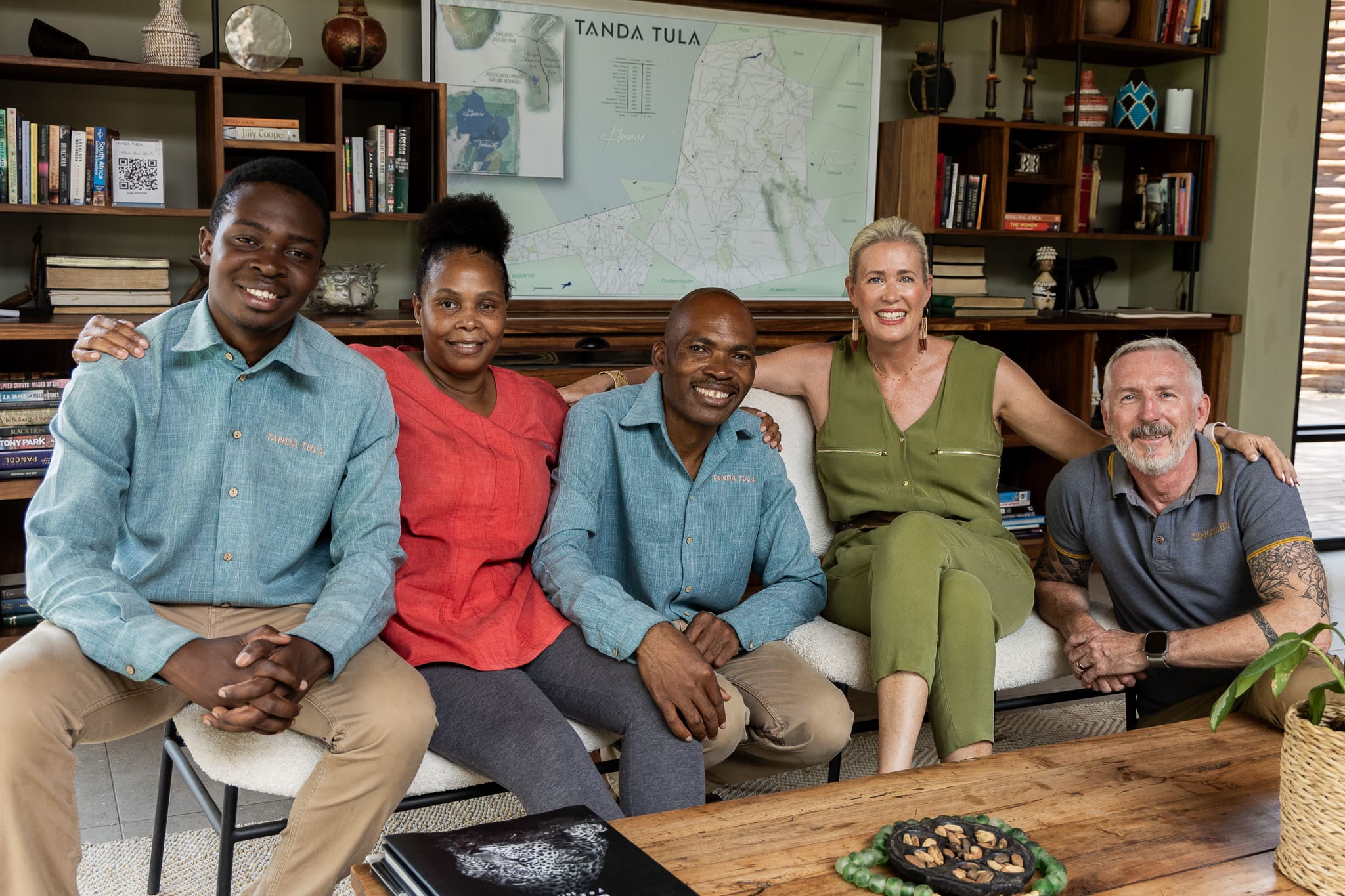 The Mathebula and Scott families together at Tanda Tula, symbolising friendship, leadership, and shared legacy within the lodge family.