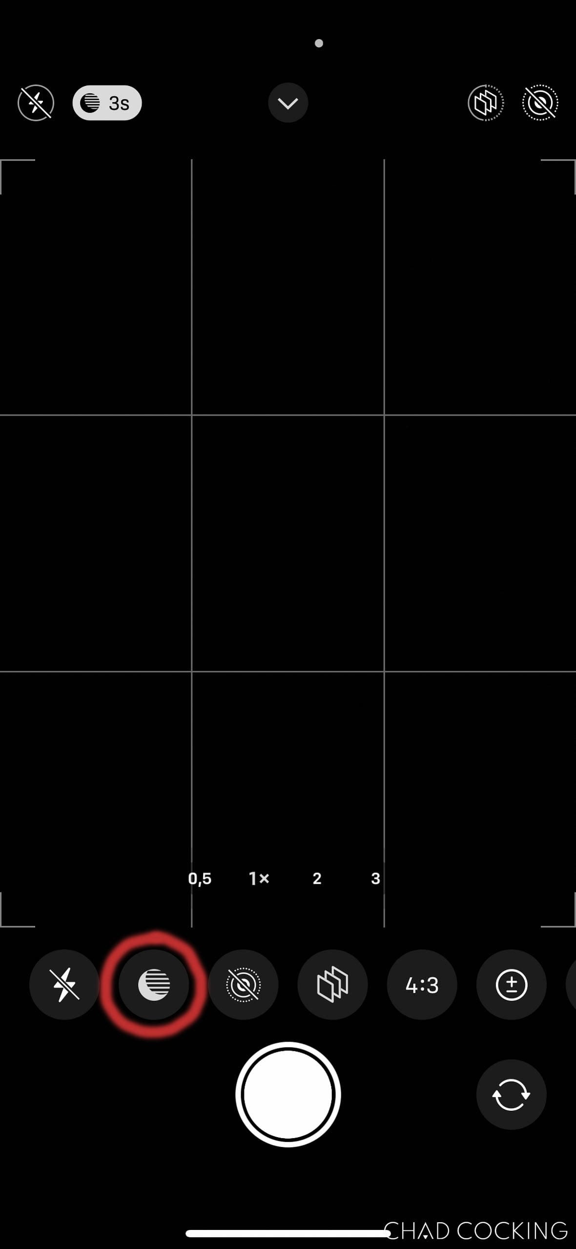 iPhone camera interface with the night mode icon highlighted.